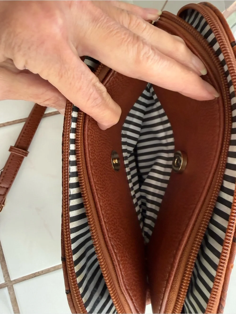 Women's Brown Crossbody Bag with Crock Print & Tassel Zip Pocket